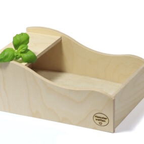 Das Foto zeigt ein Sandbad für Hamster im Wellendesign