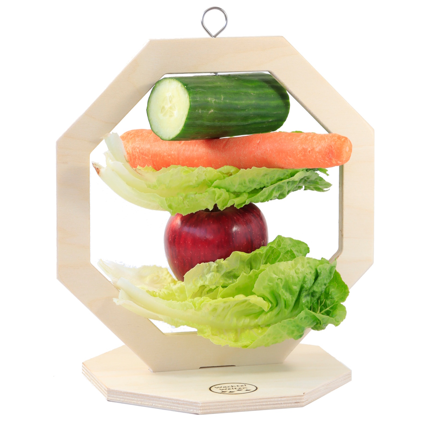 Das Foto zeigt den Snackständer "Picktagon" bestückt mit Karotte, Gurke, Apfel und Salat