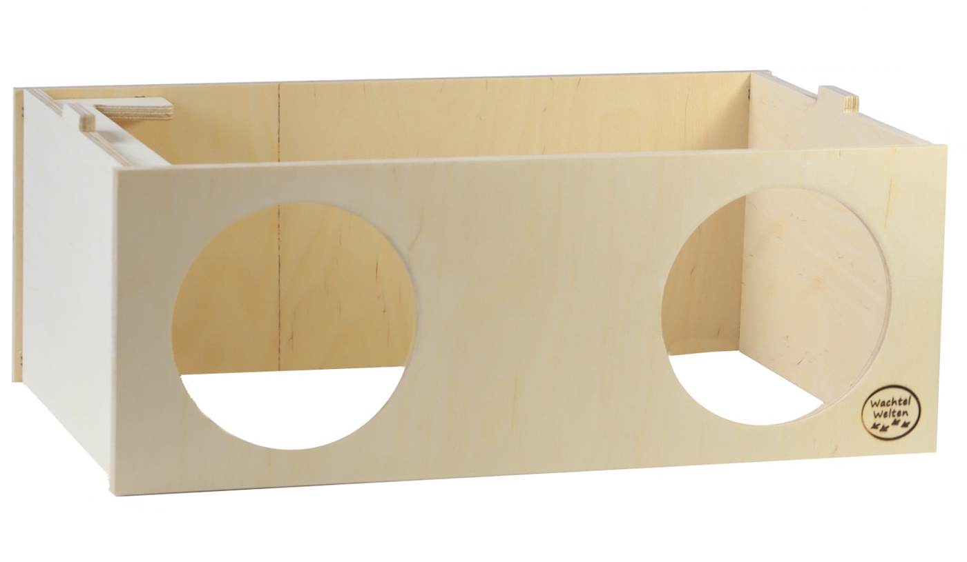 Das Foto zeigt ein Wachtelhaus aus Holz ohne Deckel