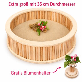 Das Foto zeigt ein großes, rundes Dübelsandbad für Hamster