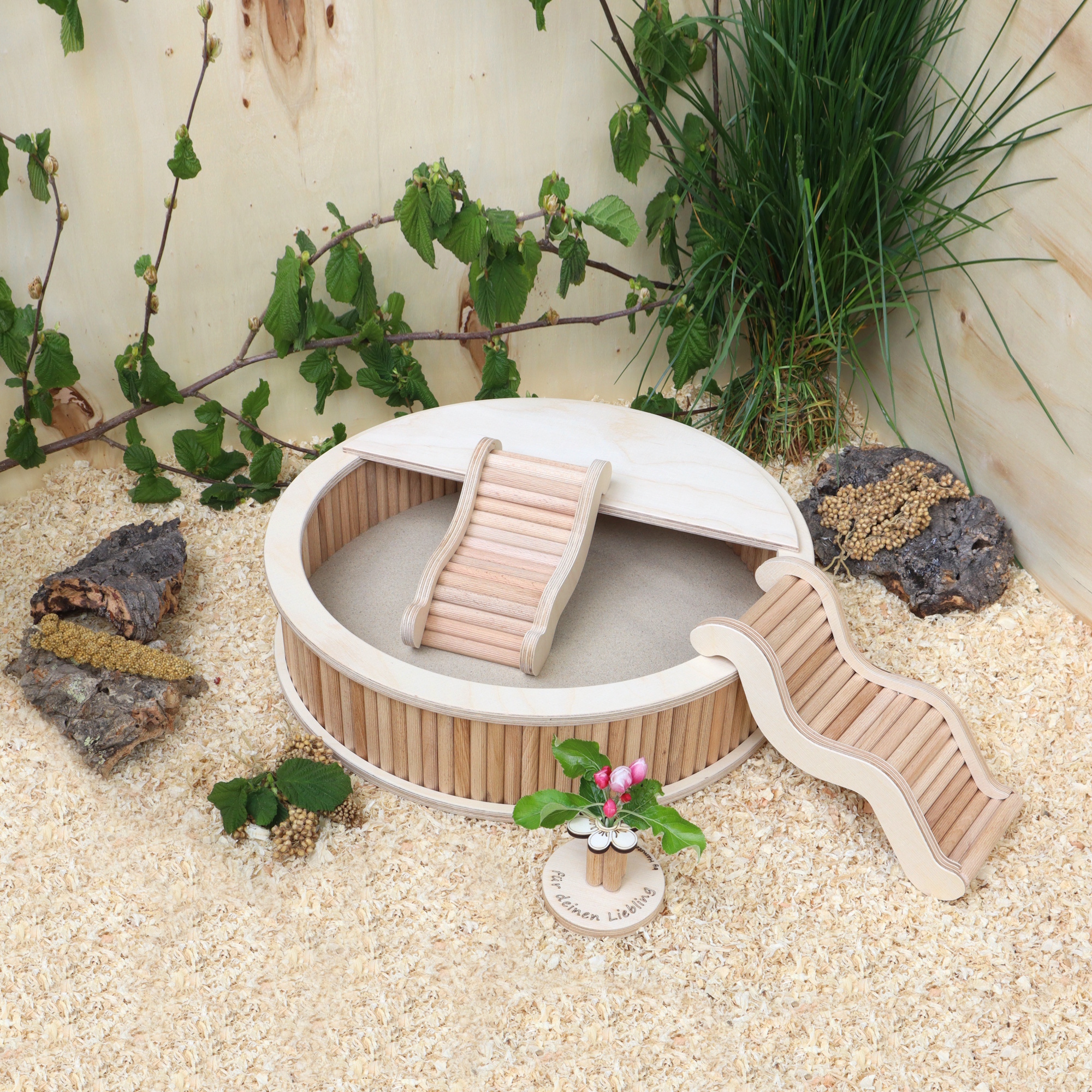 Das Foto zeigt ein Sandbad im Hamstergehege